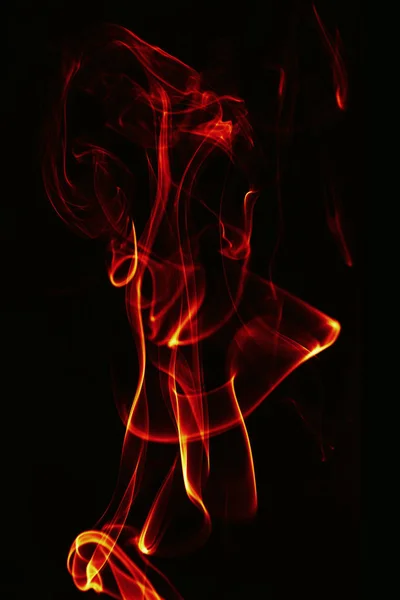 Abstract single fire flame on black background — Stock Photo, Image