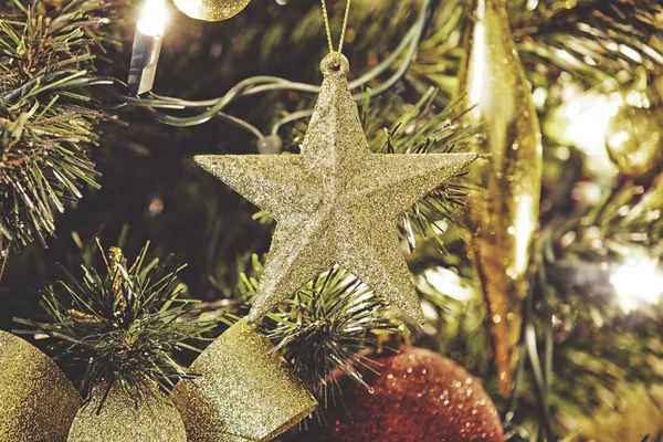Close up on Christmas decorations on tree — Stock Photo, Image