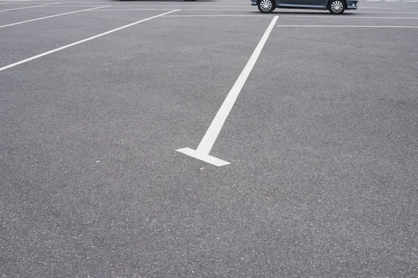 Car parking with blue car in background — Stock Photo, Image