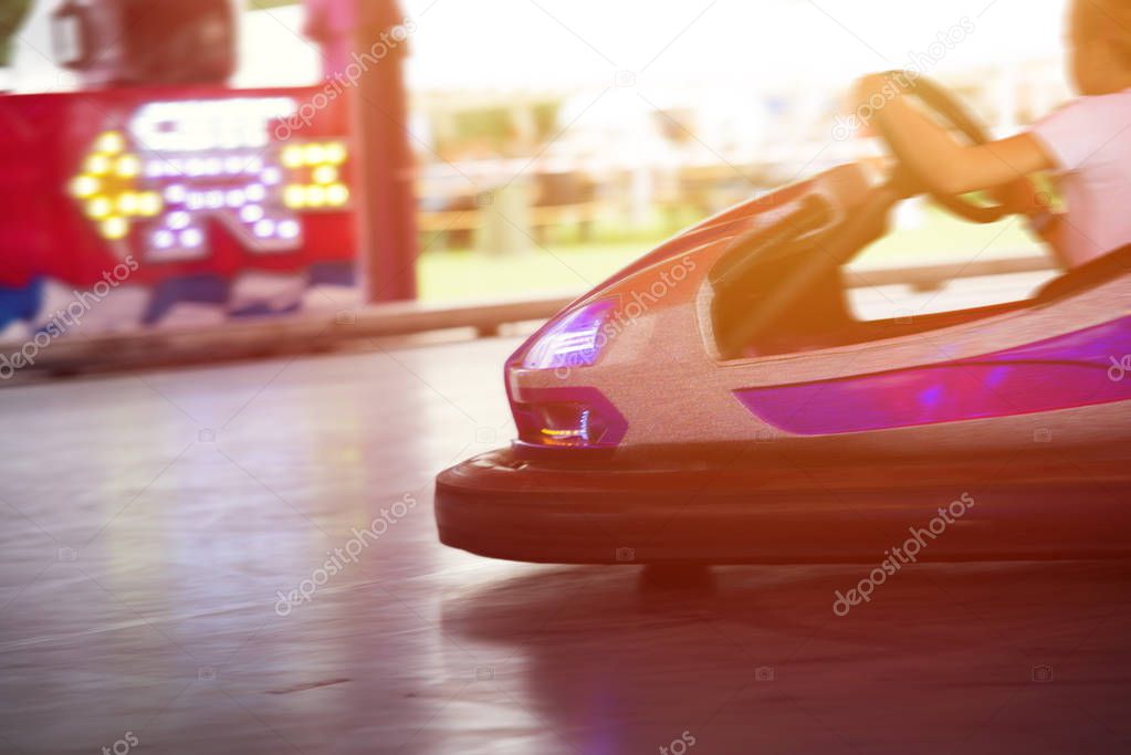 Colorful electric bumper car in autodrom in the fairground attra