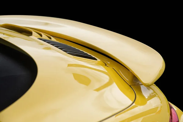 Close up on yellow sport car rear spoiler — Stock Photo, Image