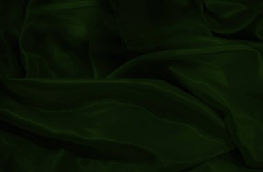 koyu yeşil ipek malzeme arka plan veya doku üzerinde kapat