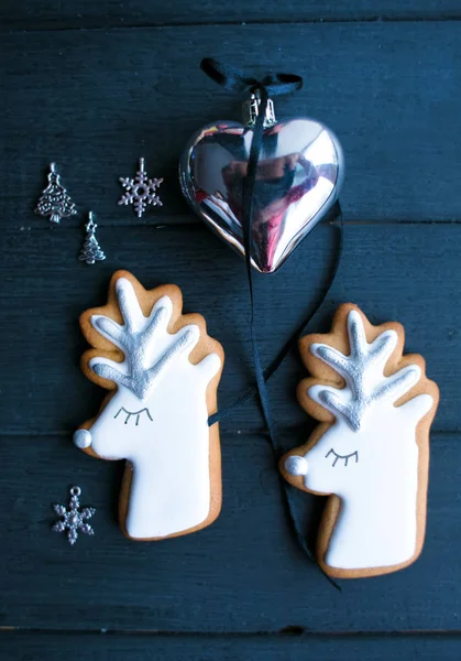 Gingerbread beautiful cookies on wood background — Stock Photo, Image