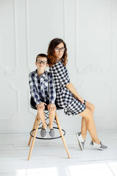 Incredible mom and son cuddle and smile — Stock Photo, Image