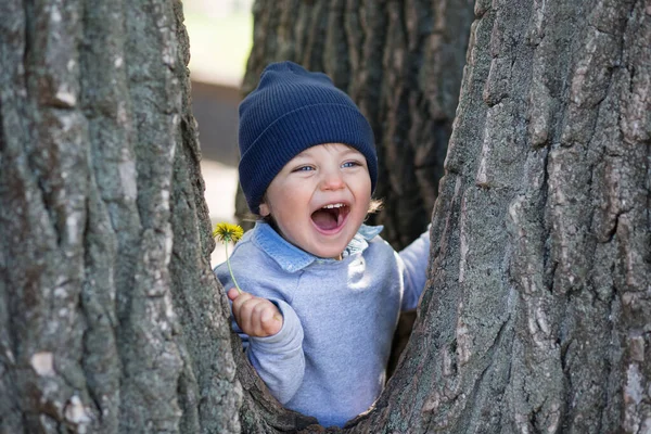 Smiling Curly Baby Blue Hat Plays Park — Stock Photo, Image