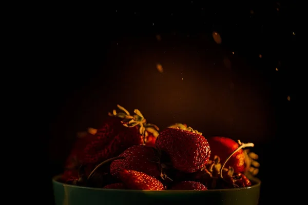 Red Juicy Ripe Strawberries Blue Vase Black Background Drops Water — Stock Photo, Image