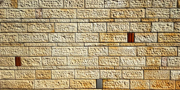 Parede de pedra fundo da fachada de construção moderna contruction — Fotografia de Stock