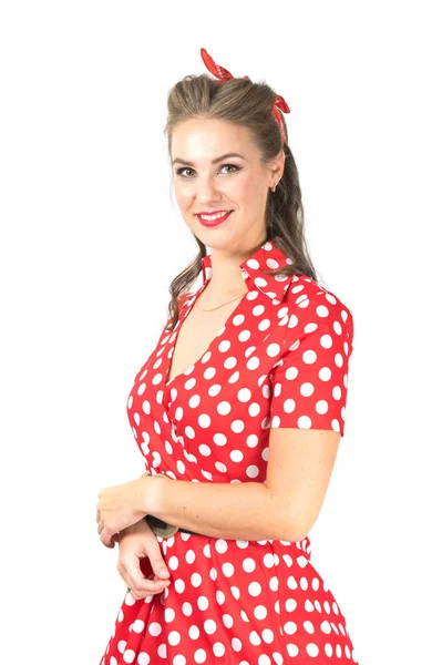 Young woman in red dotted dress 스톡 사진