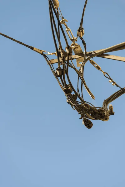 Detail of obsolete and abandoned wiring in a street of a Spanish — Stock Photo, Image