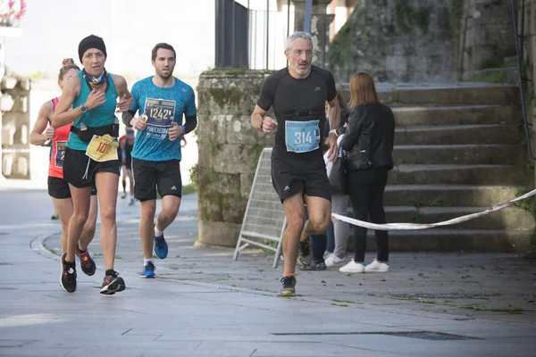 Atletas corriendo en la media maratón — Foto de Stock