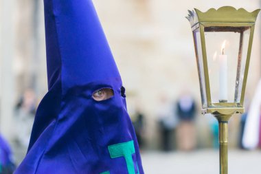 PONTEVEDRA, SPAIN - APRIL 3 2015: Detail of one of the members of a religious brotherhood, during the celebration of Holy Week in the streets of the city.