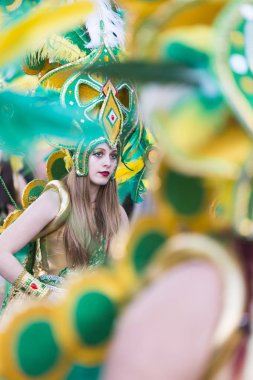 PONTEVEDRA, SPAIN - FEBRUARY 20, 2016: People dressed during the parade held in the city for the Winter Carnival.