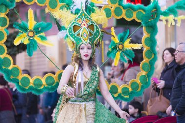 PONTEVEDRA, SPAIN - FEBRUARY 20, 2016: People dressed during the parade held in the city for the Winter Carnival.