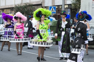 PONTEVEDRA, SPAIN - FEBRUARY 20, 2016: People dressed during the parade held in the city for the Winter Carnival.