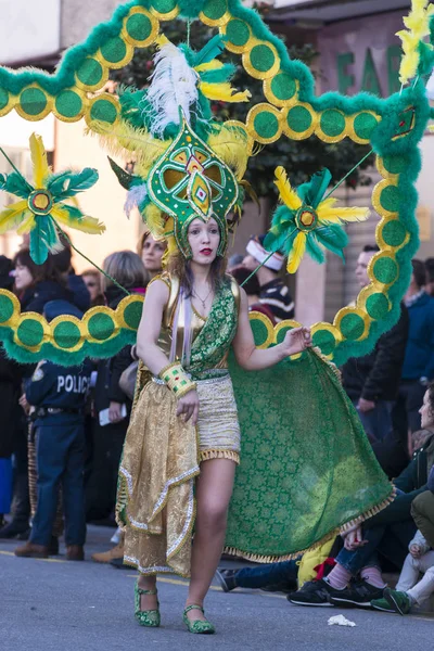 PONTEVEDRA, SPAIN - FEBRUARY 20, 2016: People dressed during the parade held in the city for the Winter Carnival.