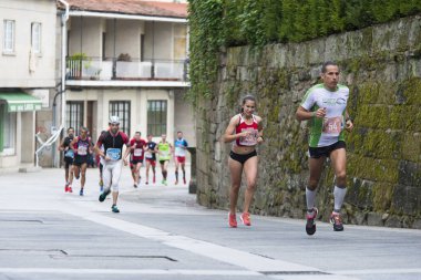 Pontevedra, İspanya - 16 Ekim 2016: Popular Half Marathon City of Pontevedra 2016 'daki katılımcıların ayrıntıları.