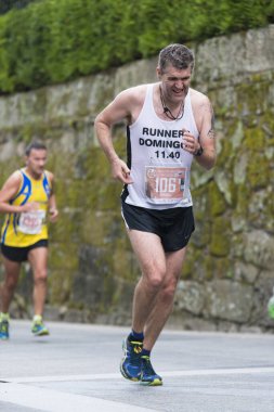 Pontevedra, İspanya - 16 Ekim 2016: Popular Half Marathon City of Pontevedra 2016 'daki katılımcıların ayrıntıları.