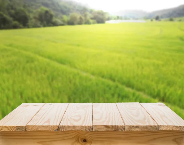 Wood Table Top Blur Green Rice Fields Background — Stock Photo, Image