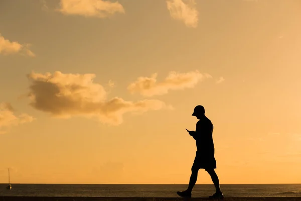Silhouette Mann Fuß Bei Sonnenuntergang — Stockfoto