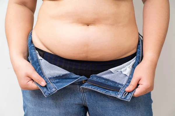 Overweight women wearing a jeans — Stock Photo, Image