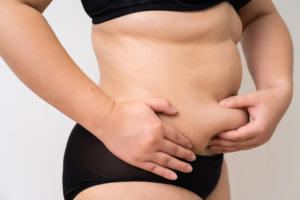 Overweight women belly black underwear — Stock Photo, Image