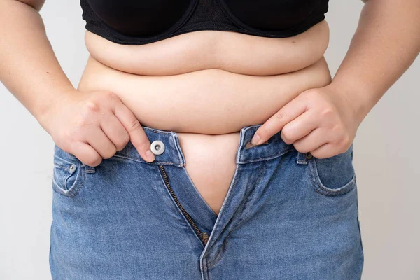 Overweight women big belly dressing jean — Stock Photo, Image
