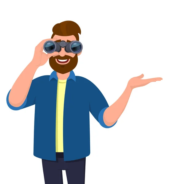 Young bearded man looking through binoculars. Person holding binocular and pointing or presenting hand to copy space. Male character design illustration. Modern lifestyle concept in cartoon. — Stock Vector