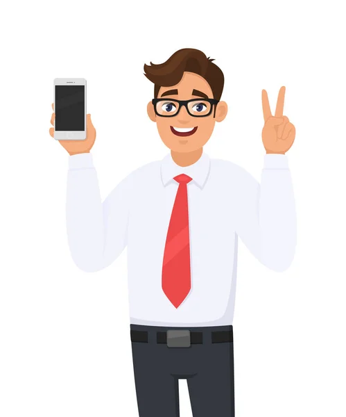 Forretningsmand viser nyt mærke, nyeste smartphone. Mand holder celle, mobiltelefon i hånden og gestikulere / gøre sejr, V, fred eller to tegn. Moderne livsstil, digital teknologi enhed & gadget . – Stock-vektor
