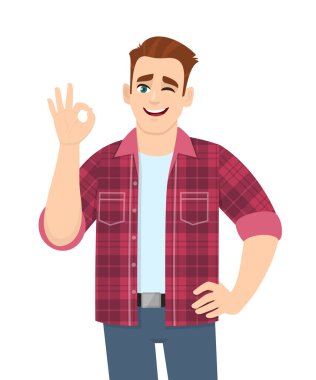 Modayı takip eden genç adam işaret veriyor ve göz kırpıyor. Şık bir insan parmaklarıyla havalı bir jest yapabilir. Erkek karakter çizimi izole edildi. Vektör karikatürde insan duyguları ve ifadeleri kavramı.