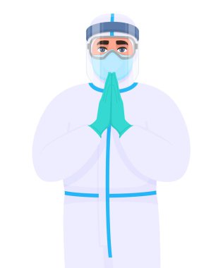 Koruyucu giysili, maskeli, gözlüklü ve yüz koruyuculu doktor. Doktor, hoş geldin ya da selamlaşma jestini avuç içiyle birlikte yapıyor. Tıp cerrahı dua eden eller sembolü. Corona virüsü salgını