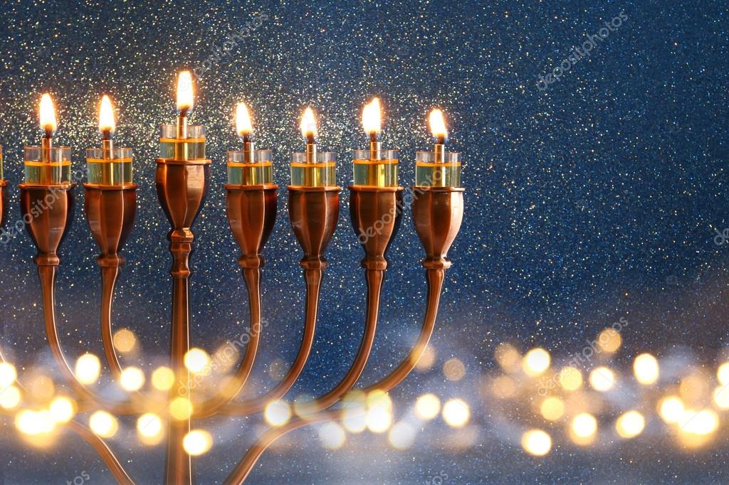 https://st3.depositphotos.com/1741969/12537/i/950/depositphotos_125378872-stock-photo-jewish-holiday-hanukkah-background.jpg