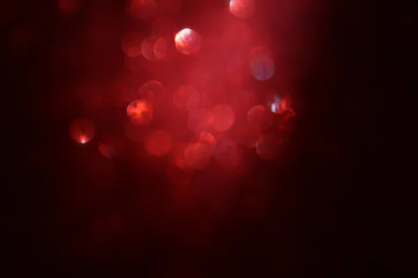 Rode glitter vintage lichten achtergrond. gedeconcentreerd — Stockfoto