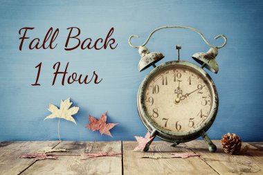 Image of autumn Time Change. Fall back concept clipart