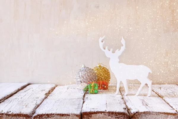Image of christmas decorations and white raindeer — Stock Photo, Image