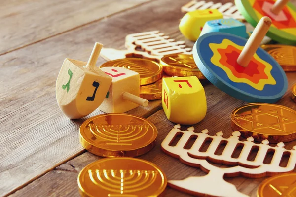 Image of jewish holiday Hanukkah with wooden dreidels