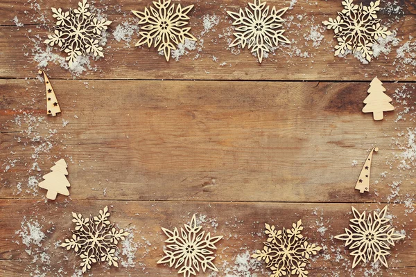 Wooden background covered with snow — Stock Photo, Image