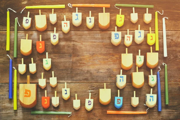 Image of jewish holiday Hanukkah with wooden dreidels — Stock Photo, Image