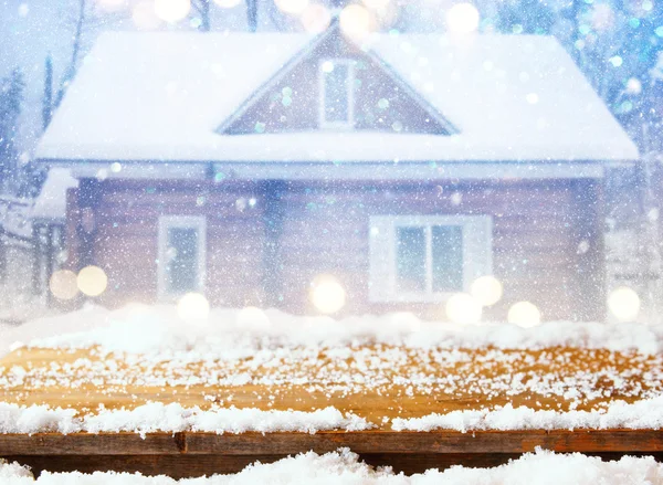 Snowy wooden table in front of dreamy winter landscape — Φωτογραφία Αρχείου