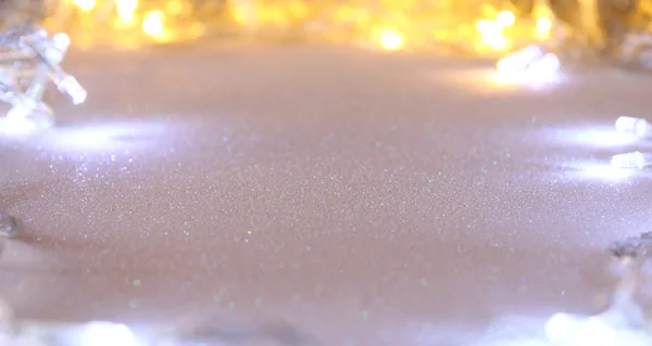 Abstraktes Bild von Weihnachtsgirlanden Lichter auf Glitzerhintergrund — Stockfoto