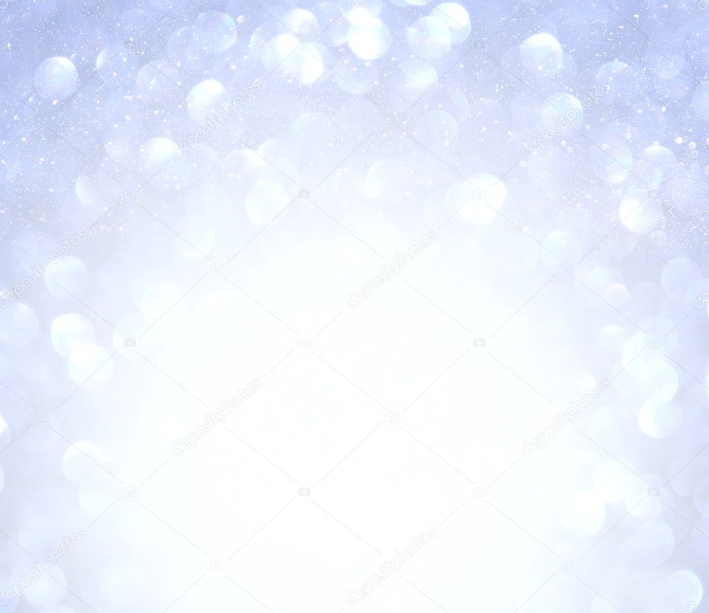 glitter vintage lights background. silver and white