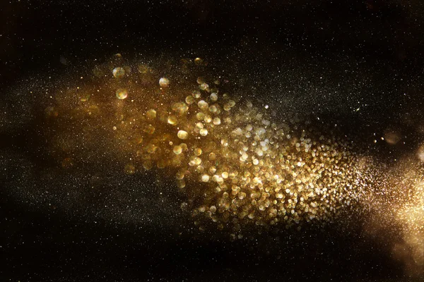 Glitter vintage lights background. dark gold and black — Stock Photo, Image