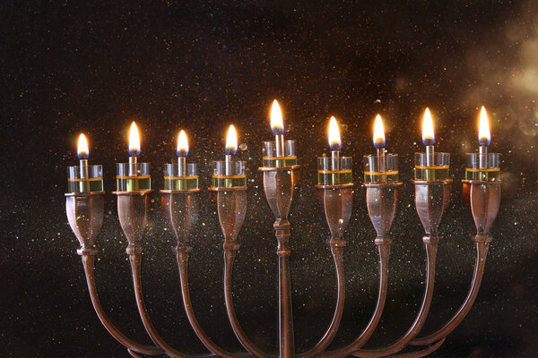 Low key Image of jewish holiday Hanukkah background