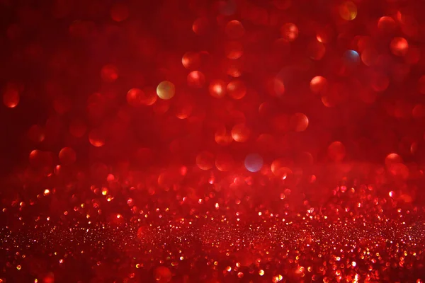 Red glitter vintage lights background. defocused. — Stock Photo, Image