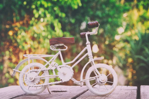 Vintage bicycle miniature toy — Stock Photo, Image