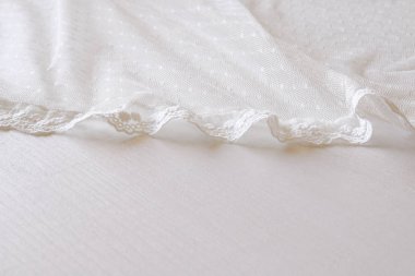 Arka plan beyaz hassas dantel kumaş
