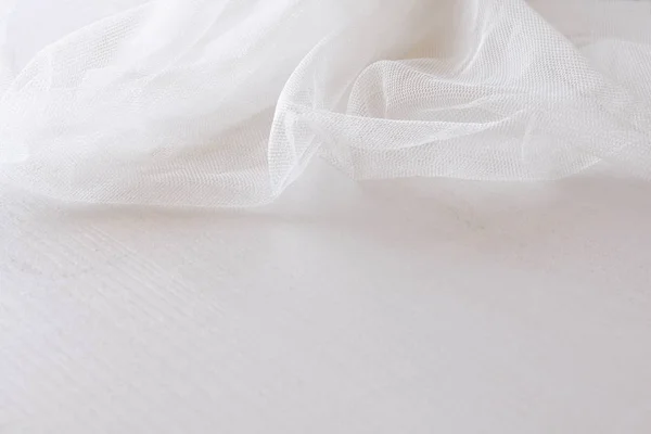 Фон из белой тонкой кружевной ткани — стоковое фото