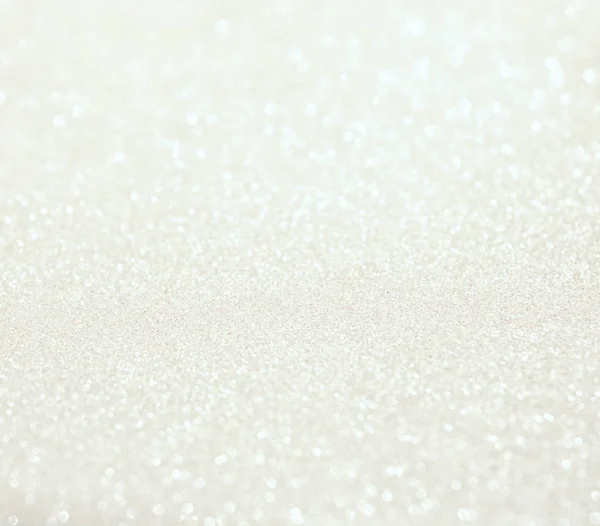Glitter vintage white lights background. de-focused — Stock Photo, Image