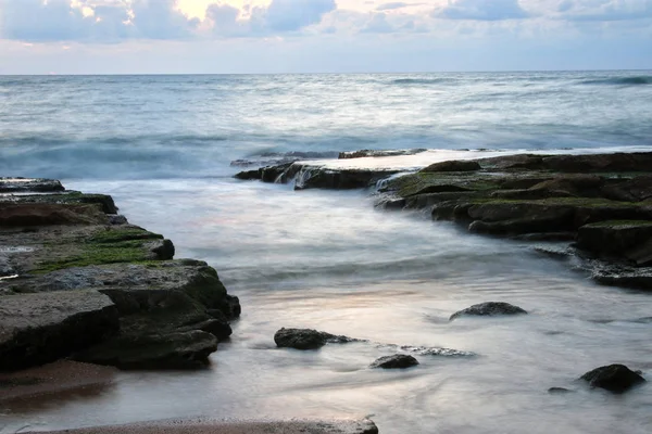 海滩和海上日落颜色的背景 — 图库照片