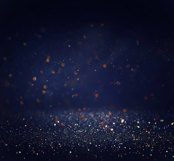 glitter vintage lights background. defocused