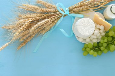 image of dairy products and fruits. Symbols of jewish holiday - Shavuot clipart